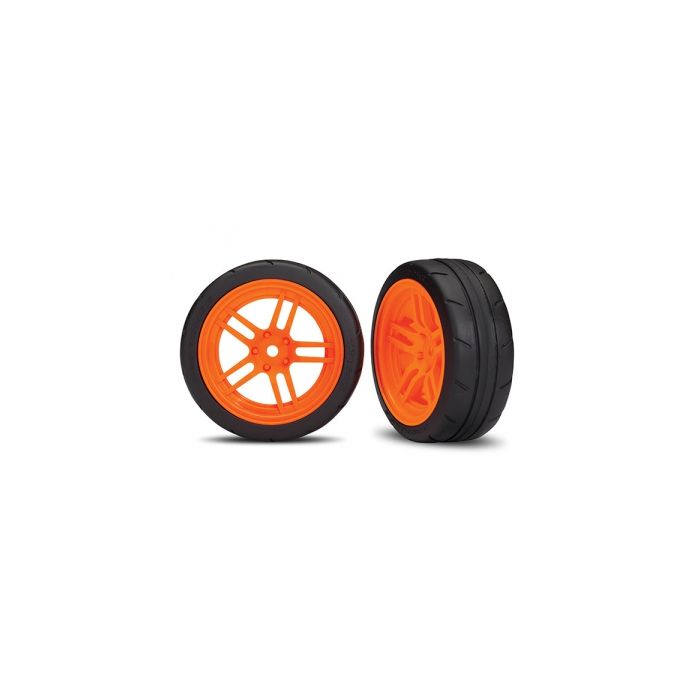 TRX8373A, Reifen auf Felgen verklebt Split-Spoke Felge orange vorn (2) , Traxxas, voor €25, Geleverd door Bliek Modelbouw, Neerloopweg 31, 4814RS Breda, Telefoon: 076-5497252